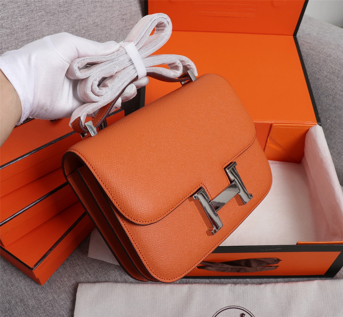 SACS HM CONSTANCE 22 ORANGE EPSOM QUINCAILLERIE ARGENTÉE