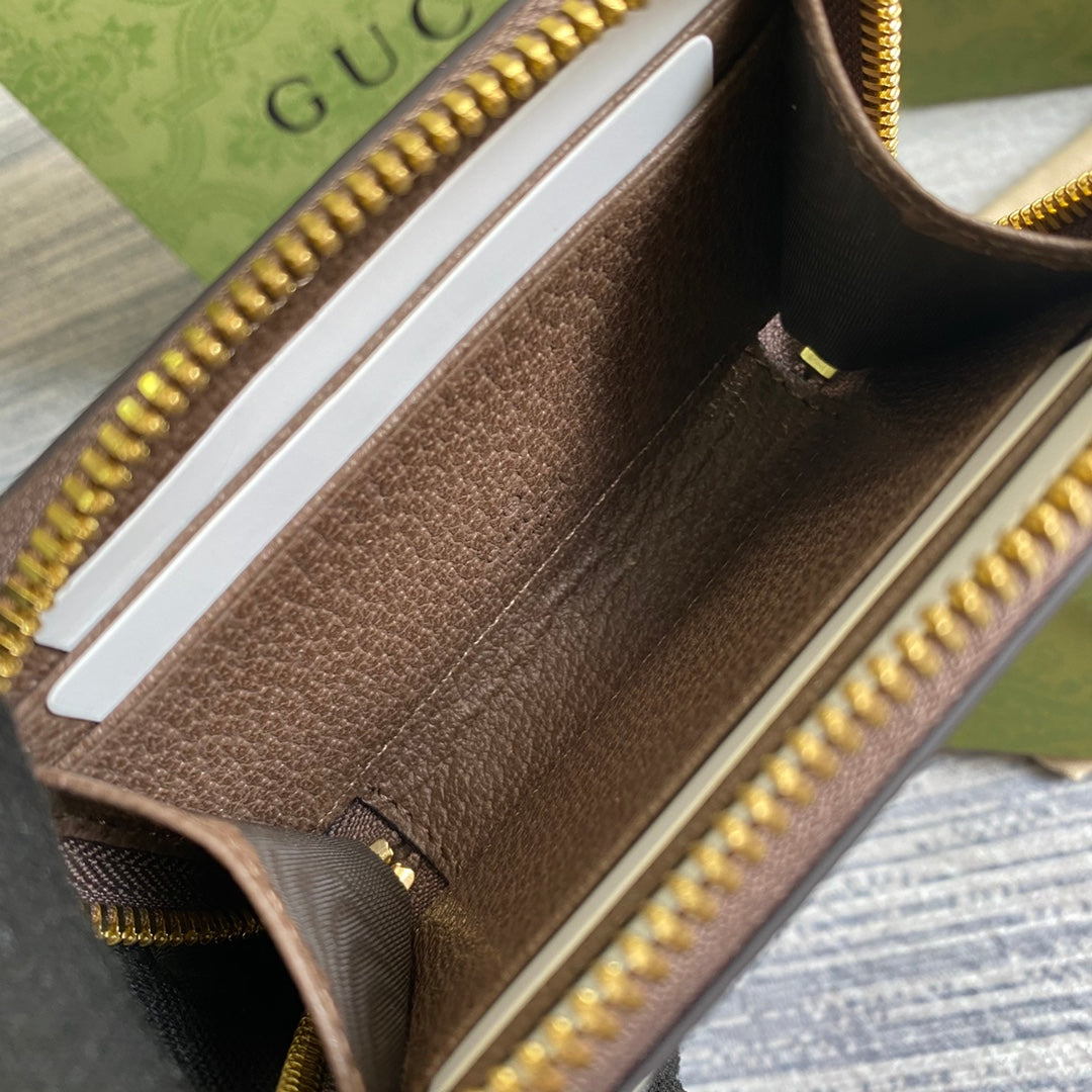 PORTEFEUILLE OPHIDIA GG 11 EN TOILE BEIGE ET ÉBÈNE