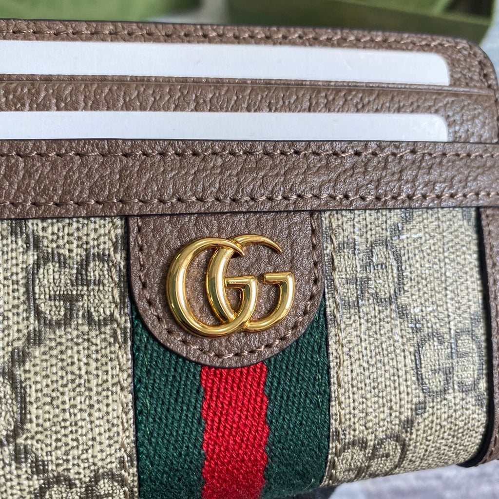 PORTEFEUILLE OPHIDIA GG 11 EN TOILE BEIGE ET ÉBÈNE