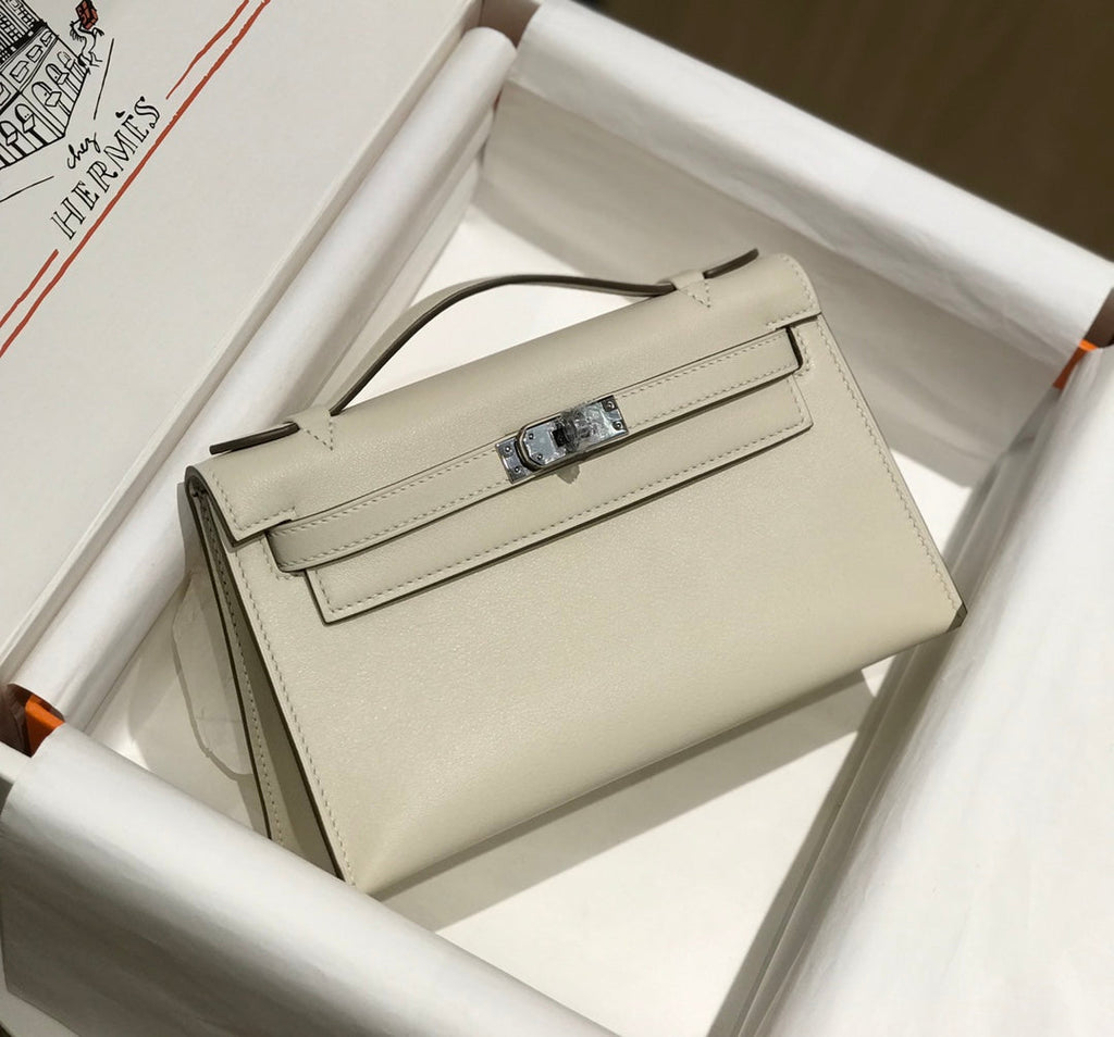 POCHETTE HM KELLY 22 CM BLANC BEIGE SWIFT QUINCAILLERIE ARGENTÉE