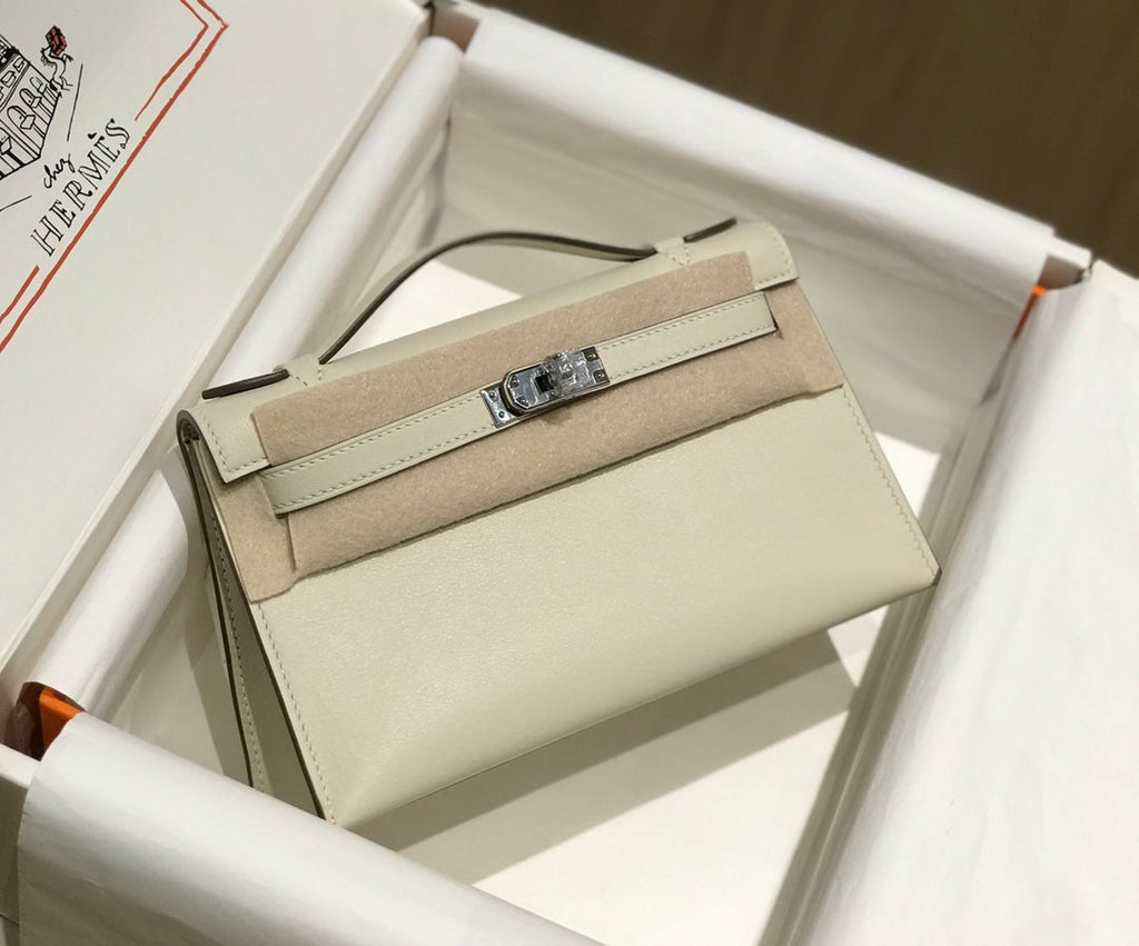 POCHETTE HM KELLY 22 CM BLANC BEIGE SWIFT QUINCAILLERIE ARGENTÉE