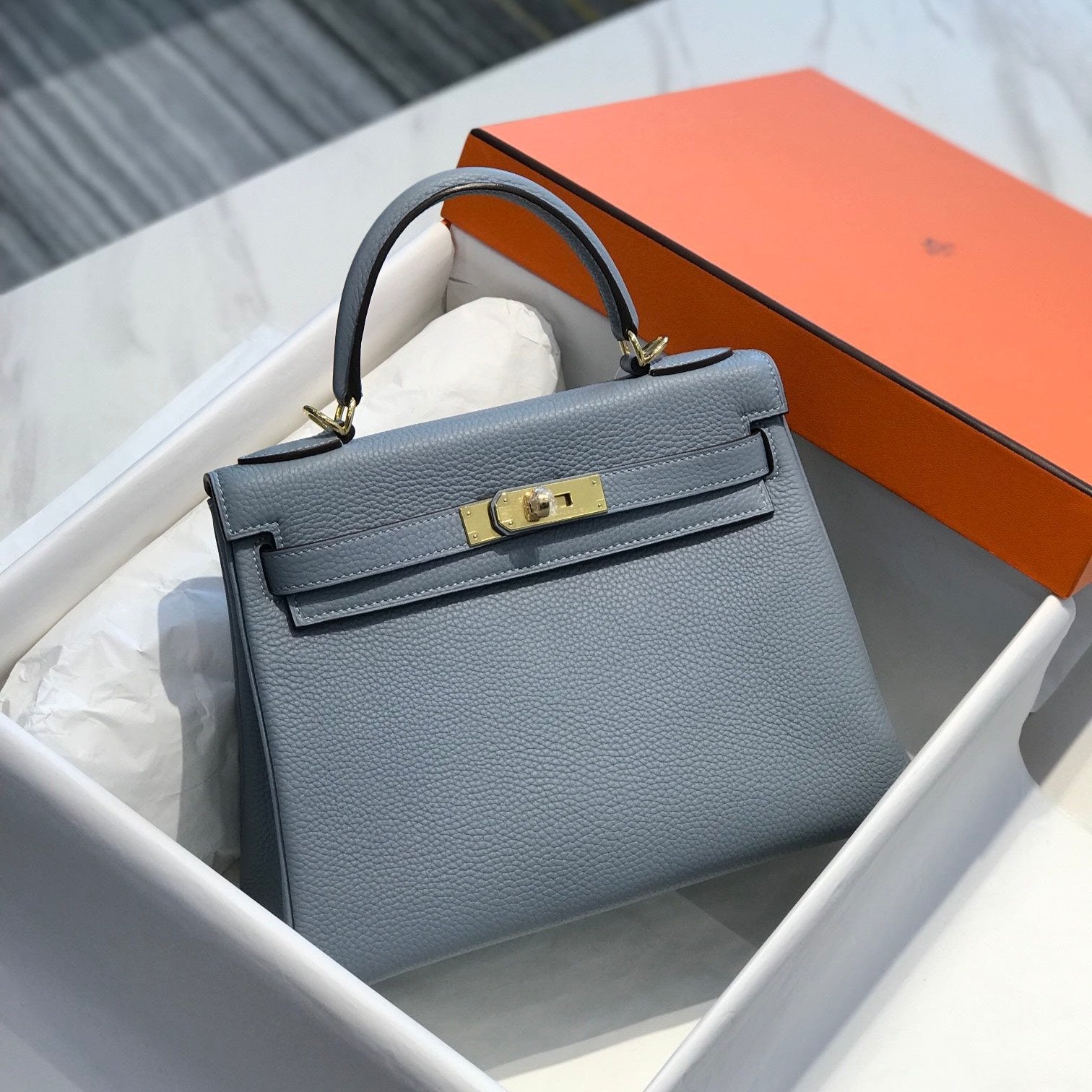SAC HM KELLY 32 CM EN TOGO GRIS TREMPÉ ET QUINCAILLERIE OR