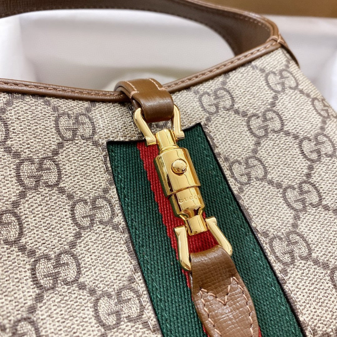 SAC À BANDOULIÈRE JACKIE 1961 MINI 19 EN TOILE BEIGE ET CUIR DE VEAU MARRON