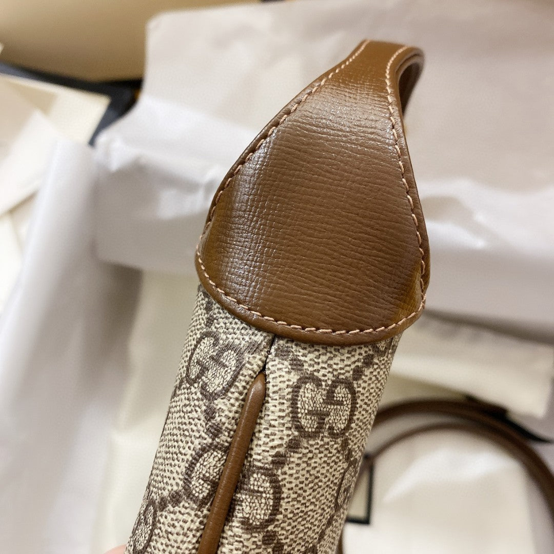 JACKIE 1961 PETIT SAC BANDOULIÈRE 28 EN TOILE BEIGE ET CUIR DE VEAU MARRON