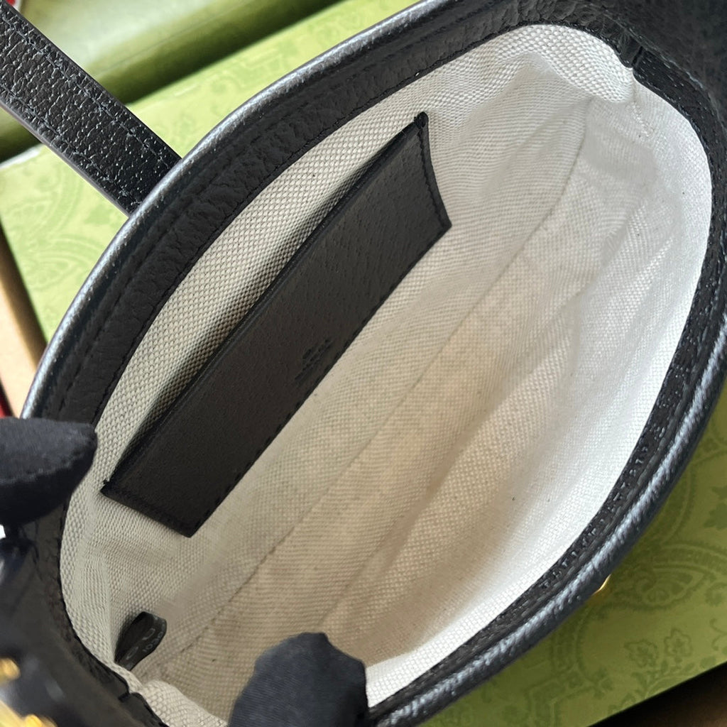 Petit sac à main Jackie 1961 19 pouces en denim noir et jaune, garniture en cuir de veau noir, matériel doré.