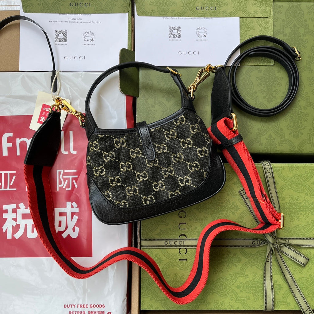 Petit sac à main Jackie 1961 19 pouces en denim noir et jaune, garniture en cuir de veau noir, matériel doré.