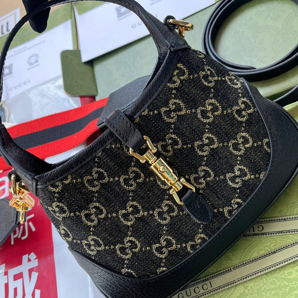 Petit sac à main Jackie 1961 19 pouces en denim noir et jaune, garniture en cuir de veau noir, matériel doré.