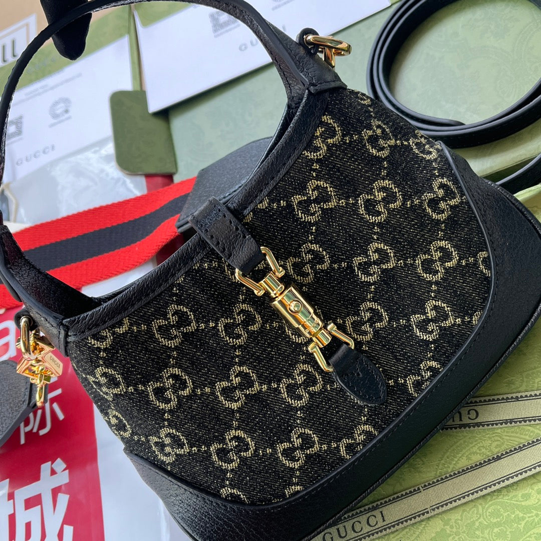 Petit sac à main Jackie 1961 19 pouces en denim noir et jaune, garniture en cuir de veau noir, matériel doré.