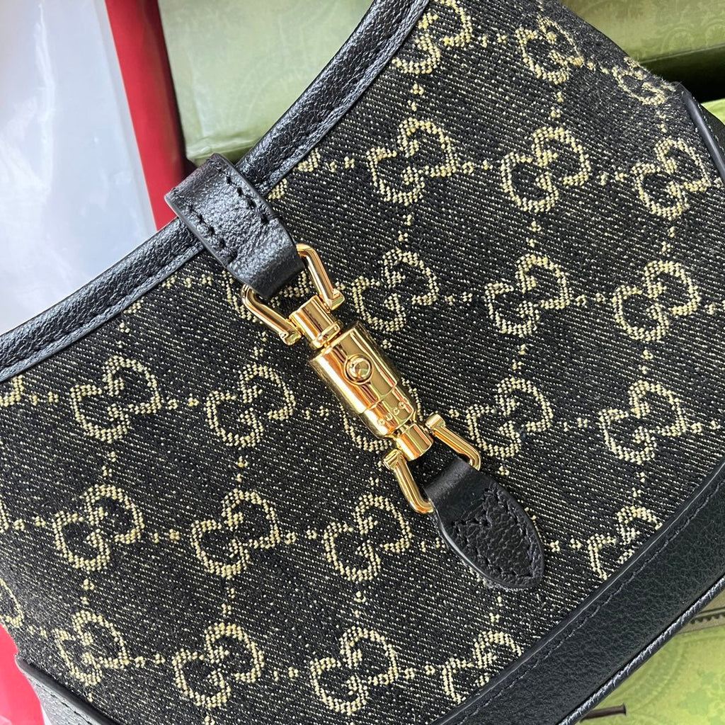 Petit sac à main Jackie 1961 19 pouces en denim noir et jaune, garniture en cuir de veau noir, matériel doré.