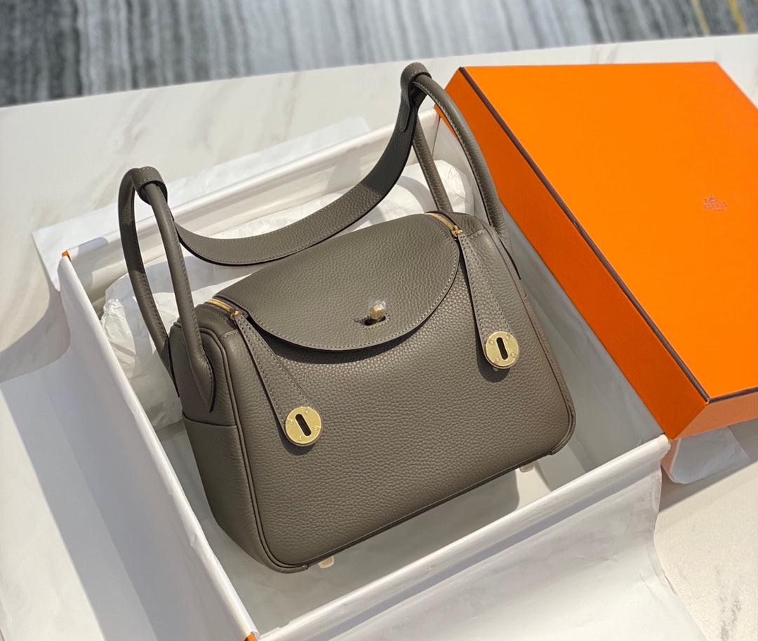 SAC HM LINDY 30 CUIR TAURILLON CLEMENCE OLIVE