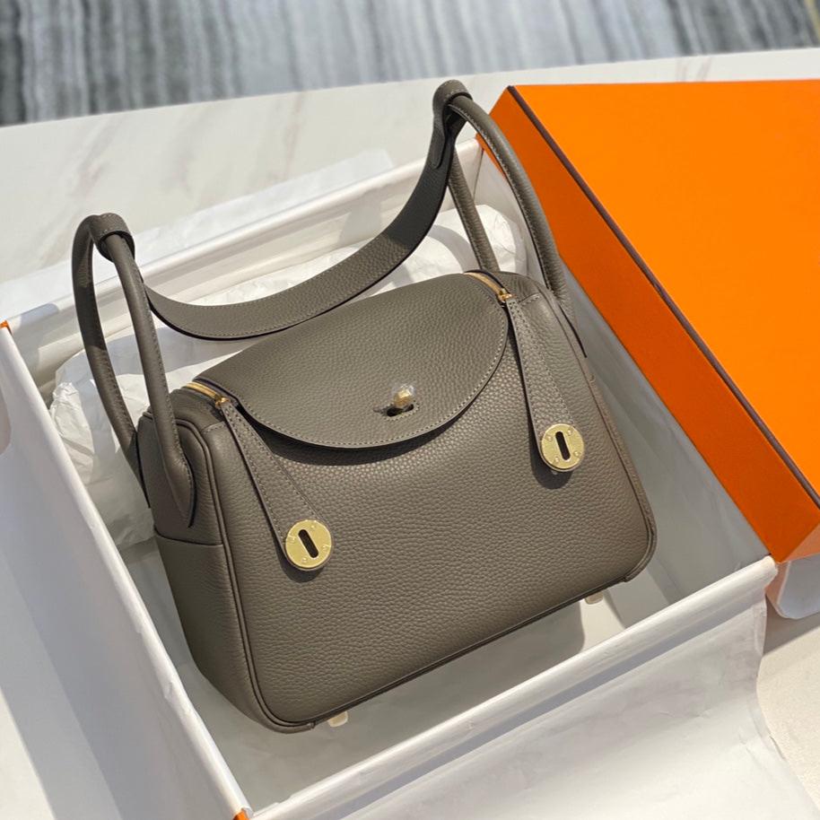 SAC HM LINDY 26 CUIR TAURILLON CLEMENCE OLIVE