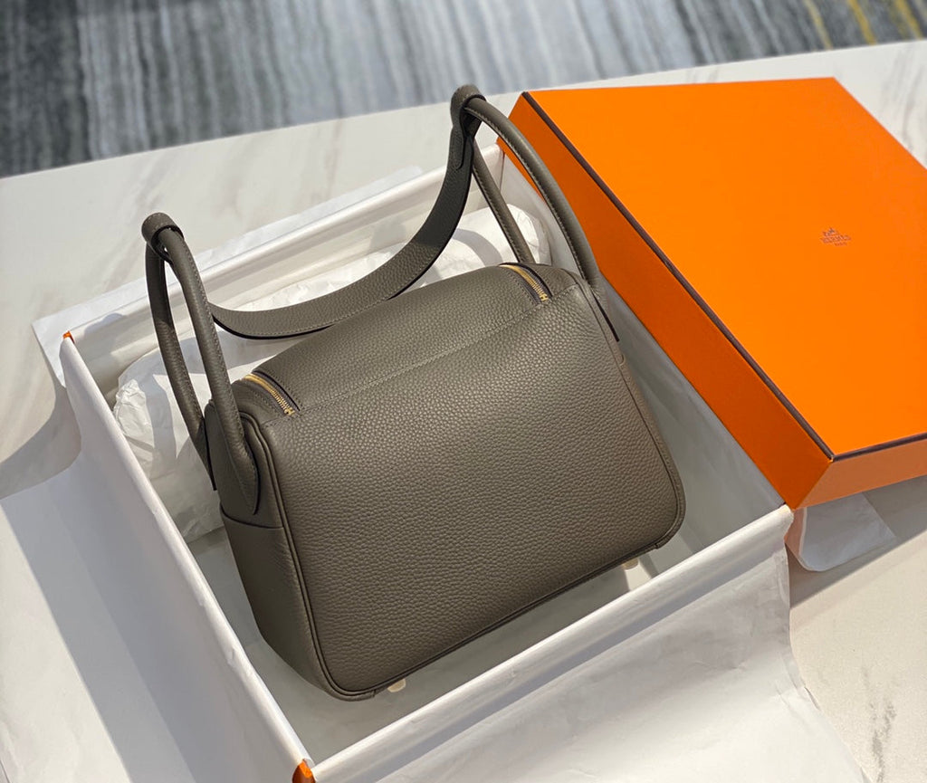 SAC HM LINDY 30 CUIR TAURILLON CLEMENCE OLIVE