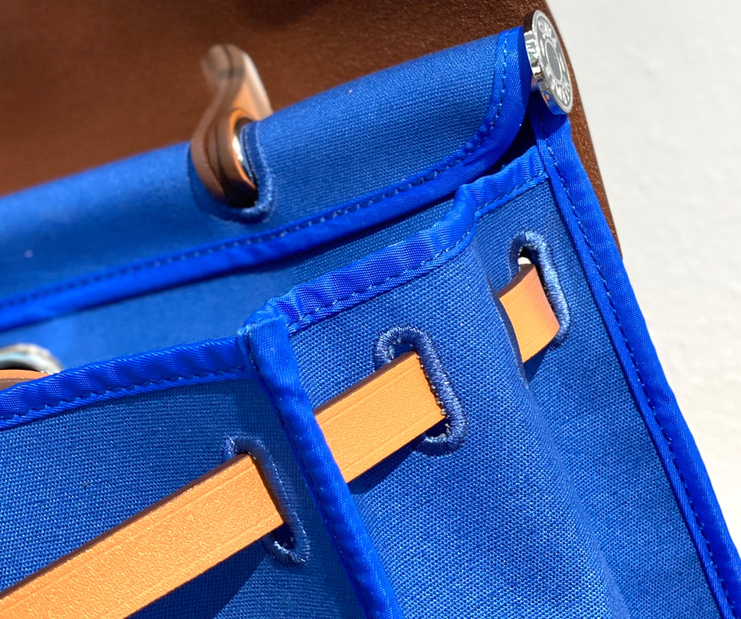 HERBAG 31 TOILE BLUE CANVAS GOLD COWHIDE LEATHER