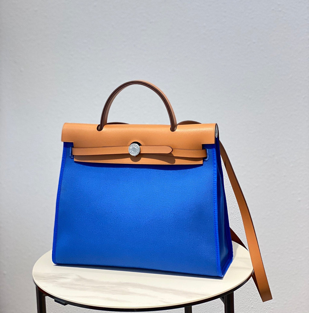 HERBAG 31 TOILE BLUE CANVAS GOLD COWHIDE LEATHER
