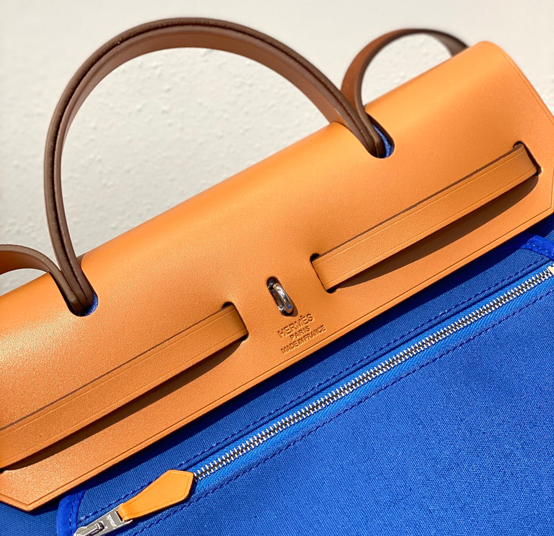 HERBAG 31 TOILE BLUE CANVAS GOLD COWHIDE LEATHER