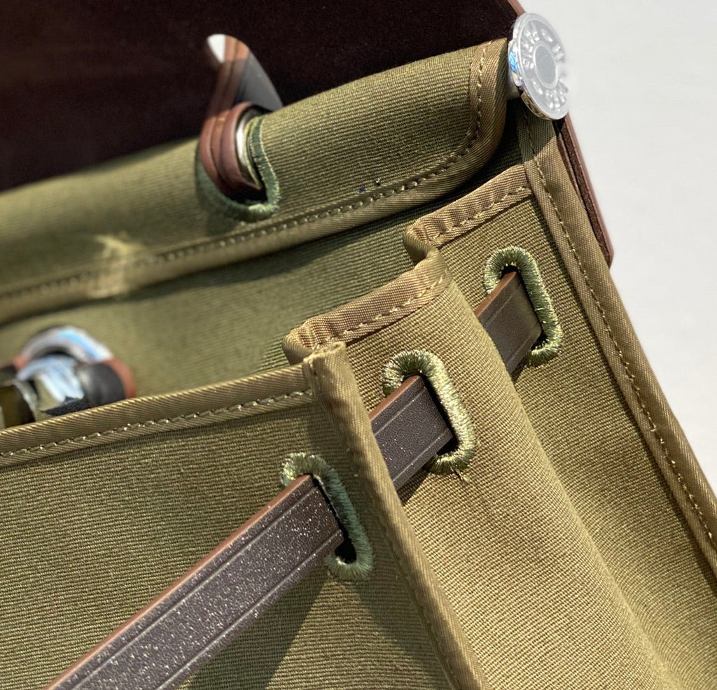 HERBAG 31 TOILE OLIVE CANVAS BLACK COWHIDE LEATHER