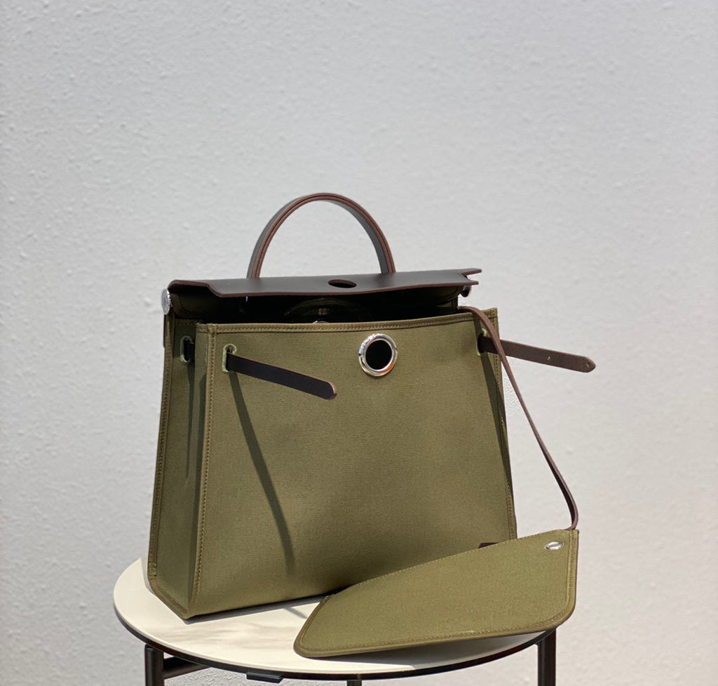 HERBAG 31 TOILE OLIVE CANVAS BLACK COWHIDE LEATHER