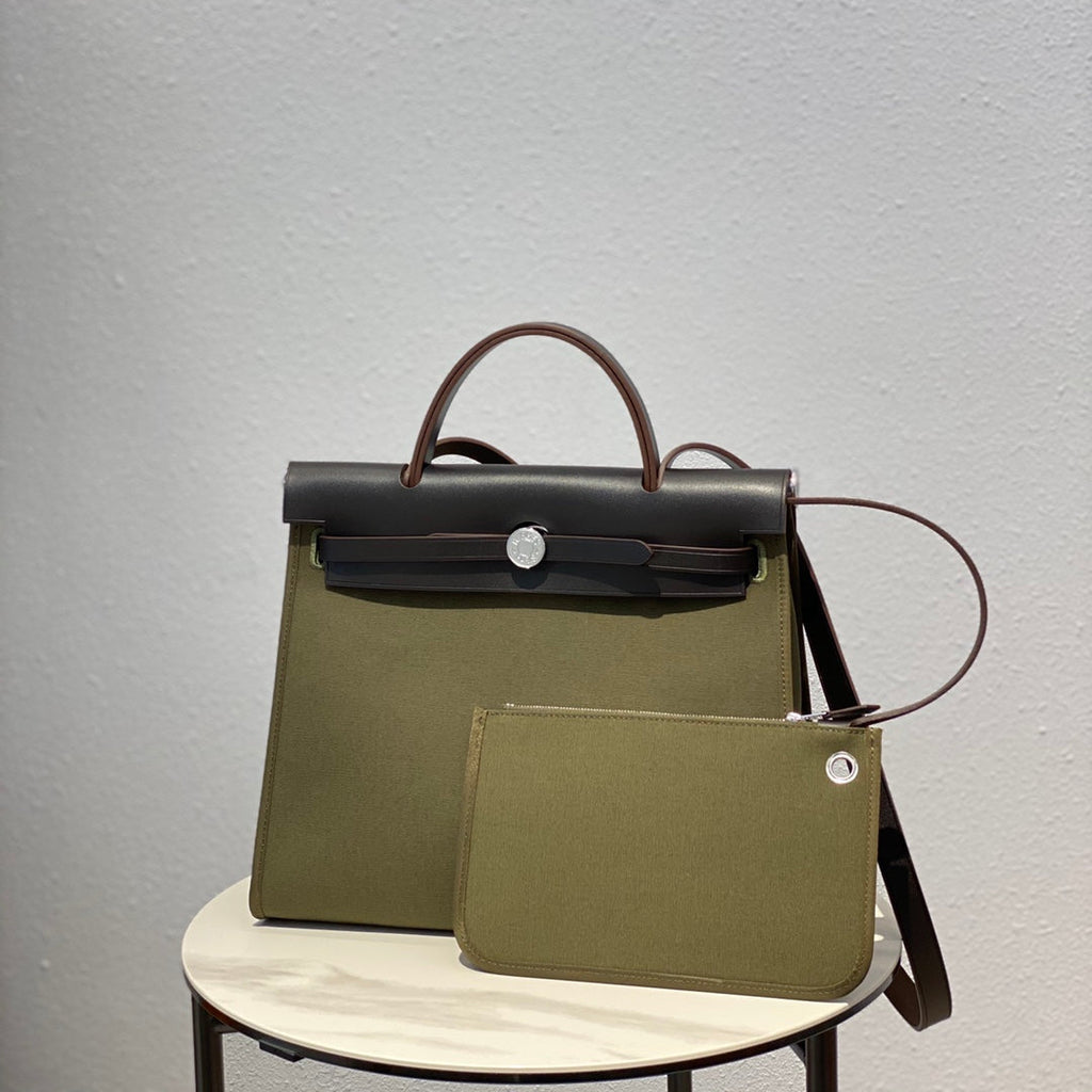 HERBAG 31 TOILE OLIVE CANVAS BLACK COWHIDE LEATHER