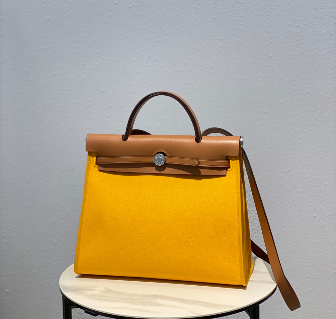 HERBAG 31 TOILE YELLOW CANVAS GOLD COWHIDE LEATHER