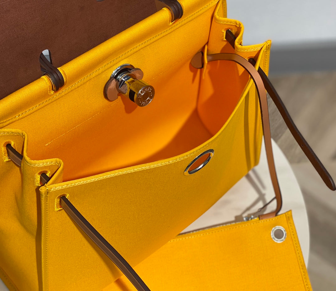 HERBAG 31 TOILE YELLOW CANVAS GOLD COWHIDE LEATHER