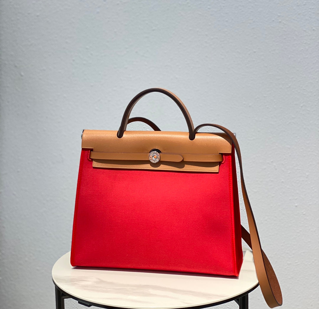 HERBAG 31 TOILE RED CANVAS GOLD COWHIDE LEATHER