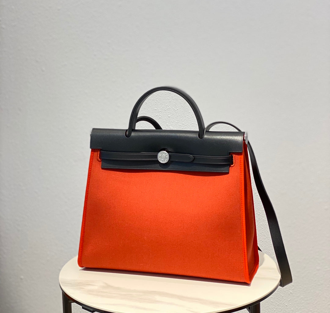 HERBAG 31 TOILE RED ORANGE CANVAS BLACK COWHIDE LEATHER
