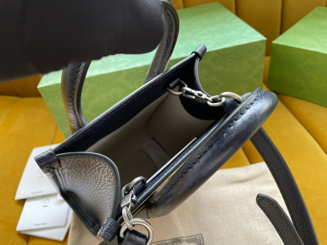 MINI SAC TOTE 20 EN TOILE BEIGE ET CUIR DE VEAU NOIR