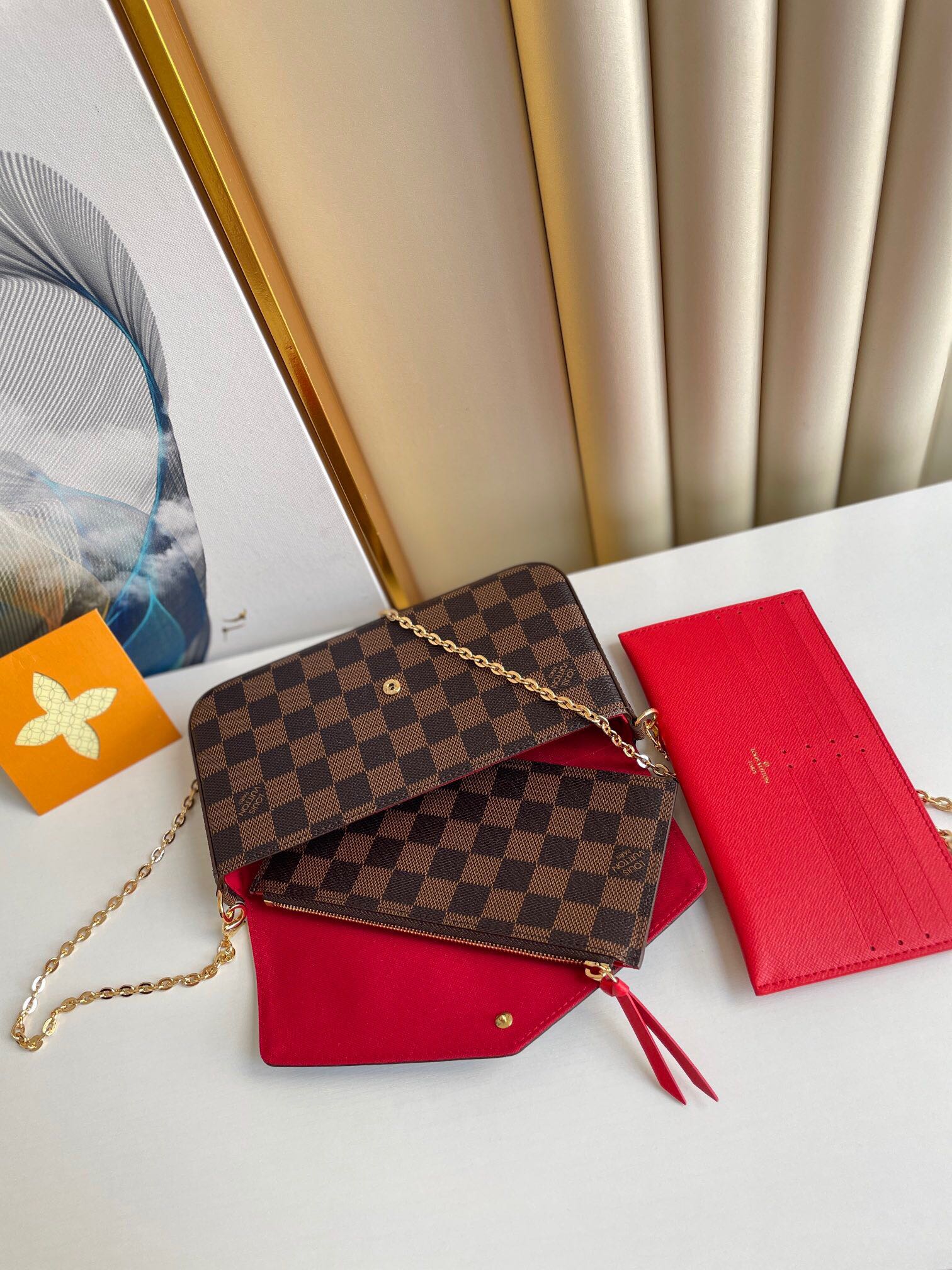 FÉLICIE POCHETTE 21 EN TOILE ENDUIT DAMIER EBENE MARRON QUINCAILLERIE OR