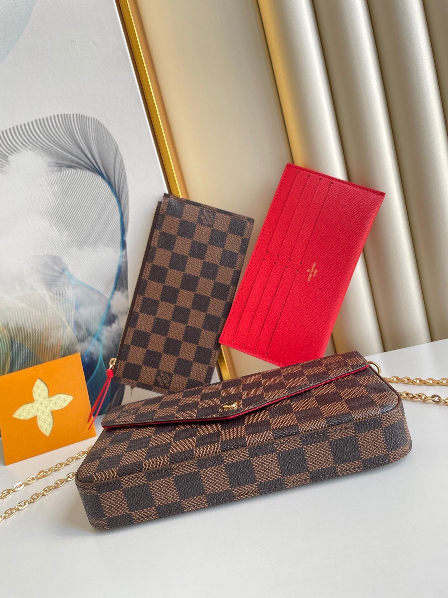 FÉLICIE POCHETTE 21 EN TOILE ENDUIT DAMIER EBENE MARRON QUINCAILLERIE OR