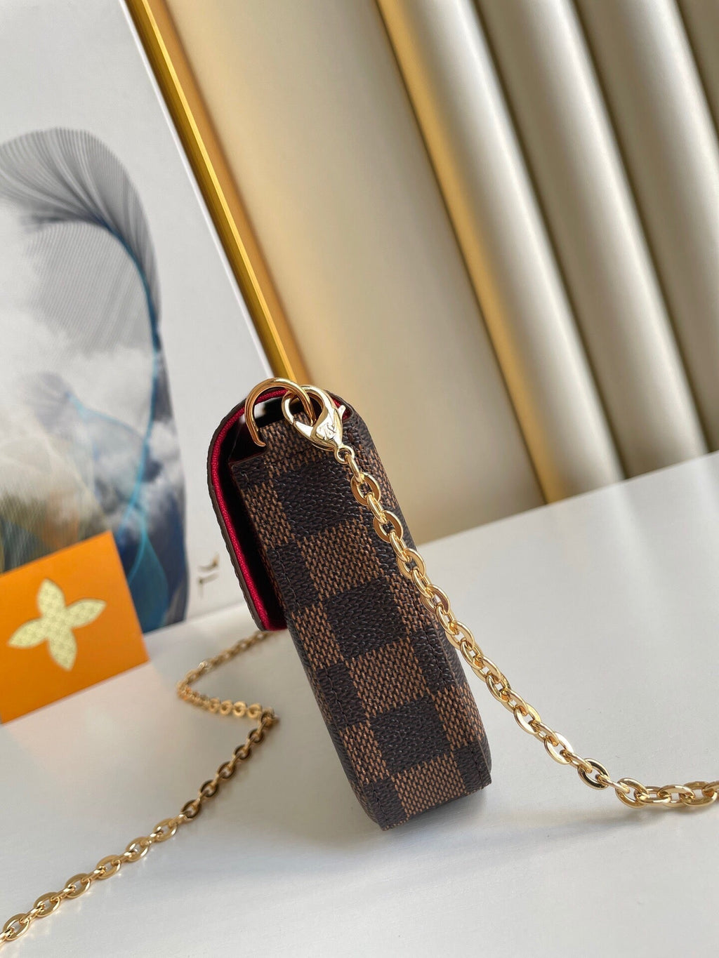 FÉLICIE POCHETTE 21 EN TOILE ENDUIT DAMIER EBENE MARRON QUINCAILLERIE OR