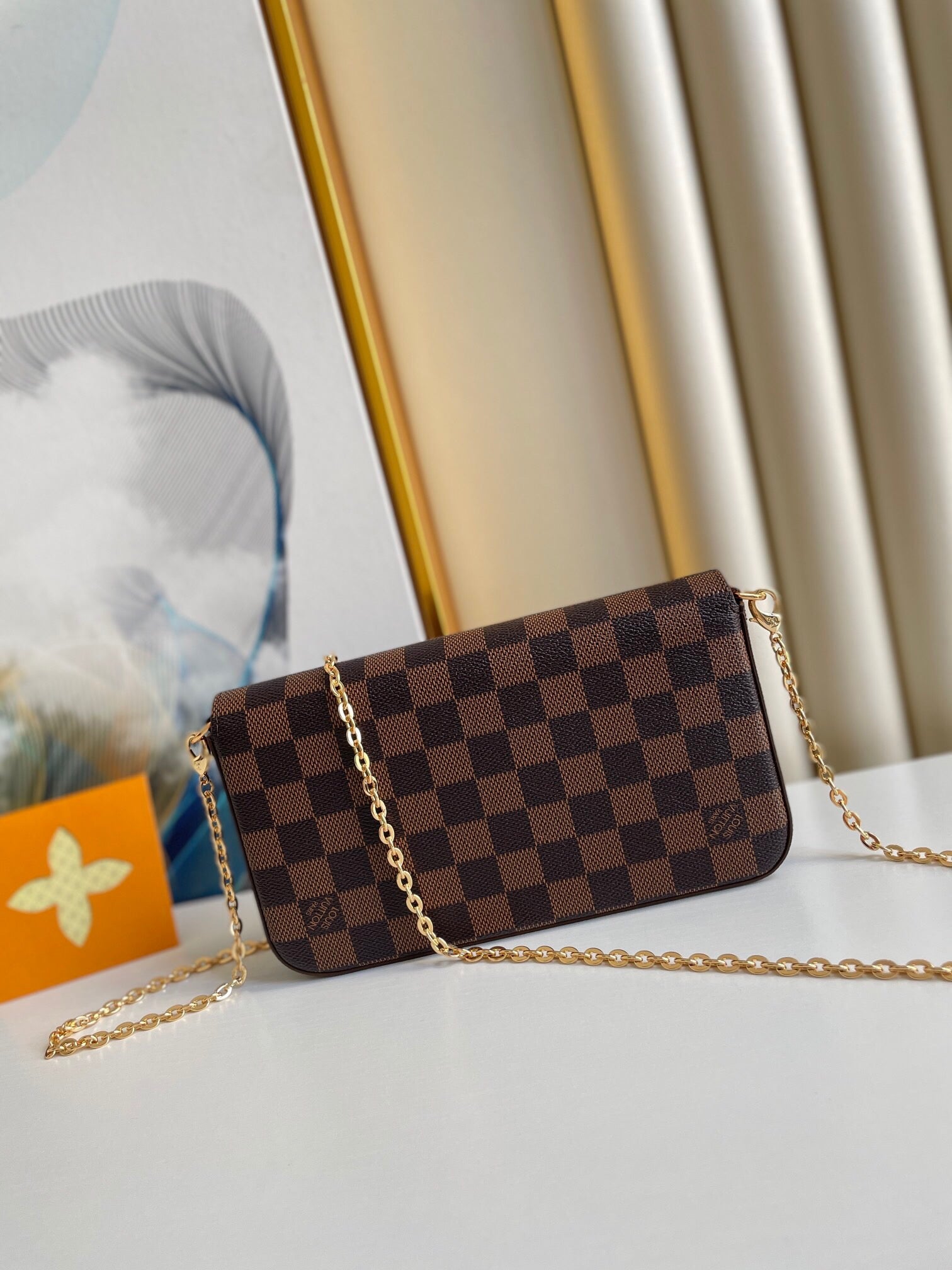 FÉLICIE POCHETTE 21 EN TOILE ENDUIT DAMIER EBENE MARRON QUINCAILLERIE OR
