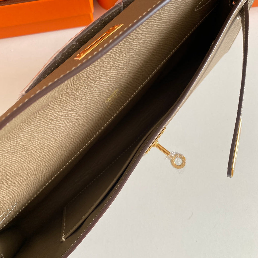 HM KELLY CUT 31 CUIR EPSOM ÉTOUPE QUINCAILLERIE DORÉ 229054
