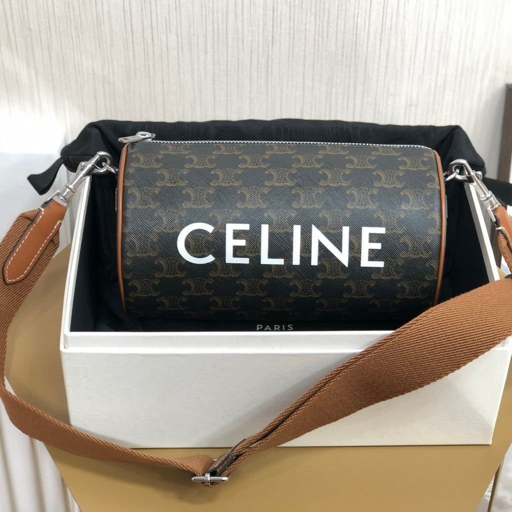 SAC CYLINDRIQUE 22 EN CUIR DE VACHE À MOTIF NOIR