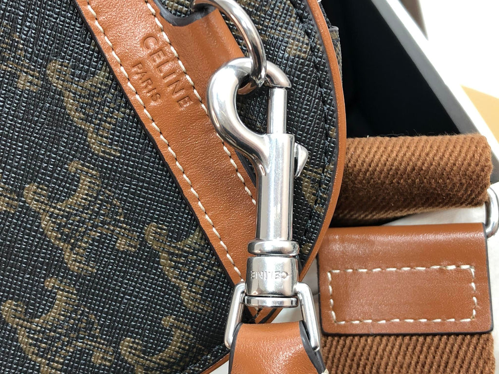 SAC CYLINDRIQUE 22 EN CUIR DE VACHE À MOTIF NOIR