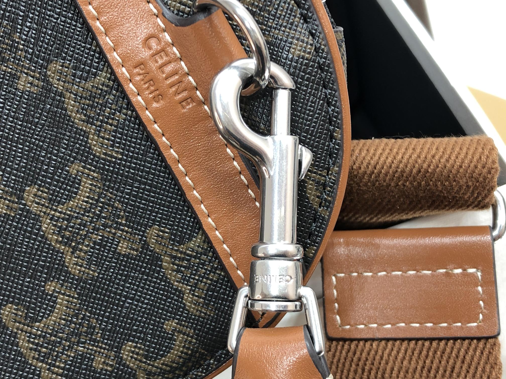 SAC CYLINDRIQUE 22 EN CUIR DE VACHE À MOTIF NOIR