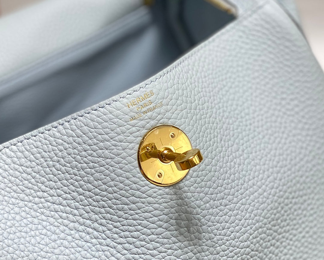 SAC HM LINDY 26 CUIR TAURILLON CLEMENCE BLEU PASTEL