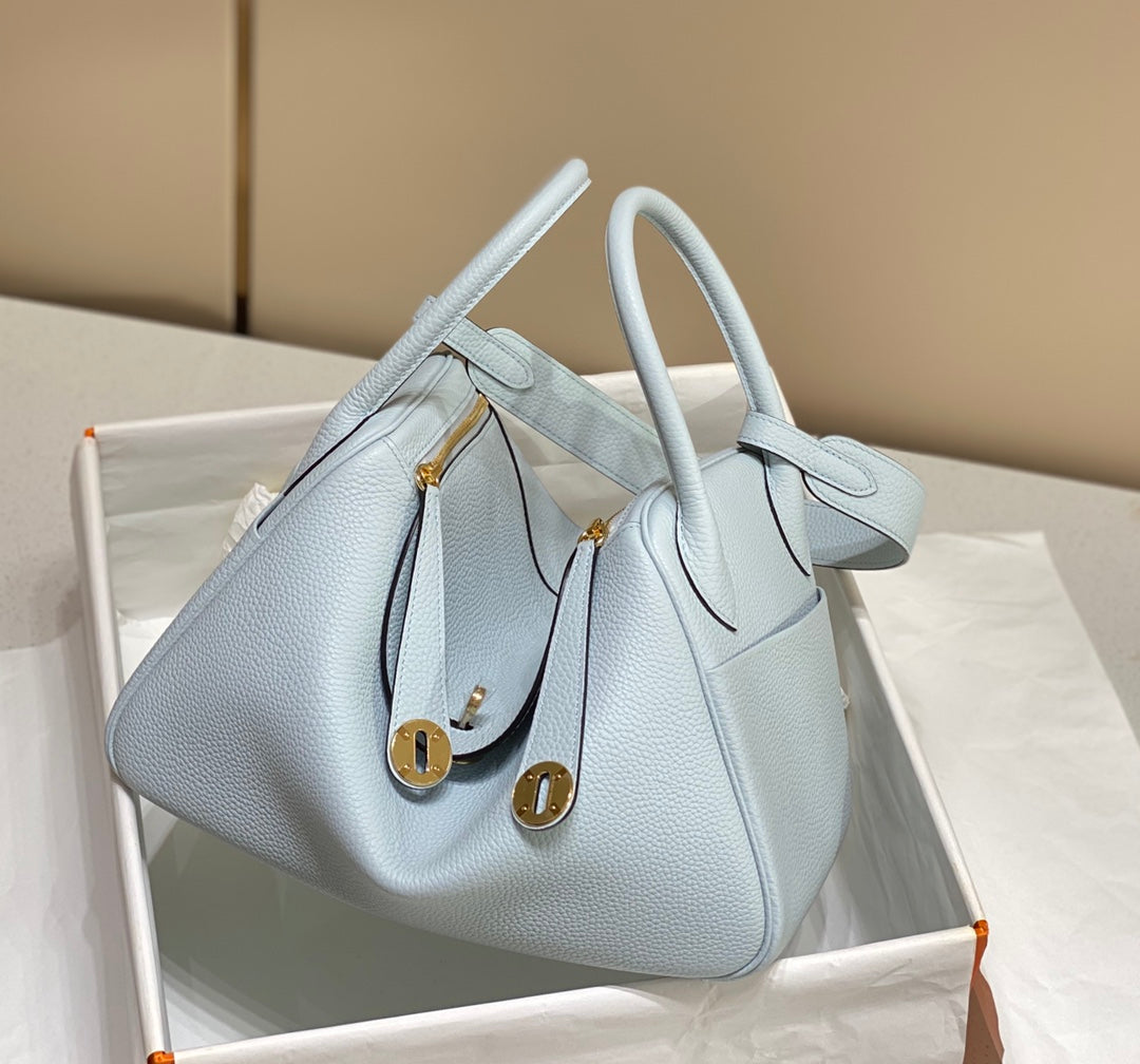 SAC HM LINDY 26 CUIR TAURILLON CLEMENCE BLEU PASTEL