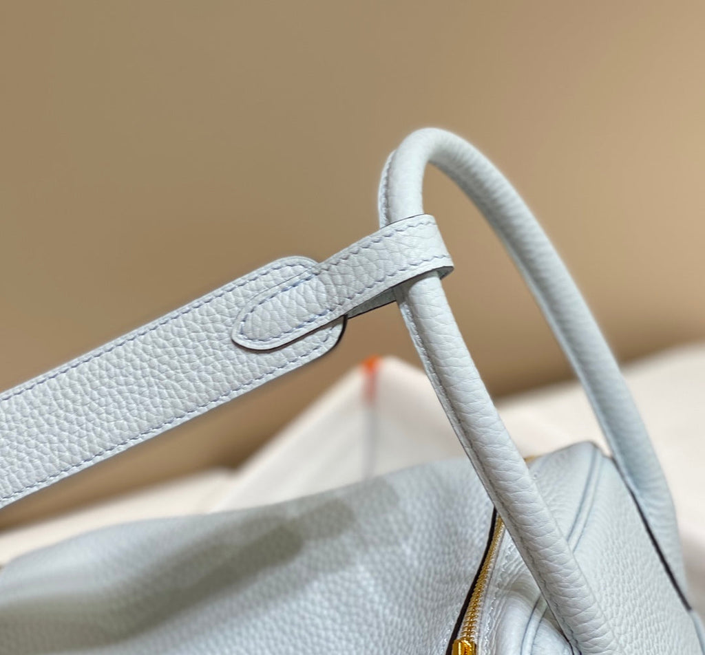 SAC HM LINDY 30 CUIR TAURILLON CLEMENCE BLEU PASTEL