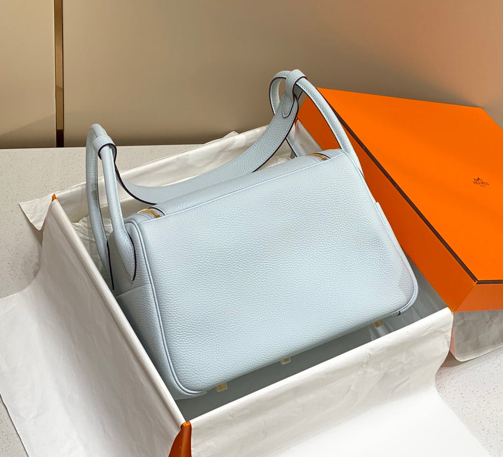 SAC HM LINDY 30 CUIR TAURILLON CLEMENCE BLEU PASTEL