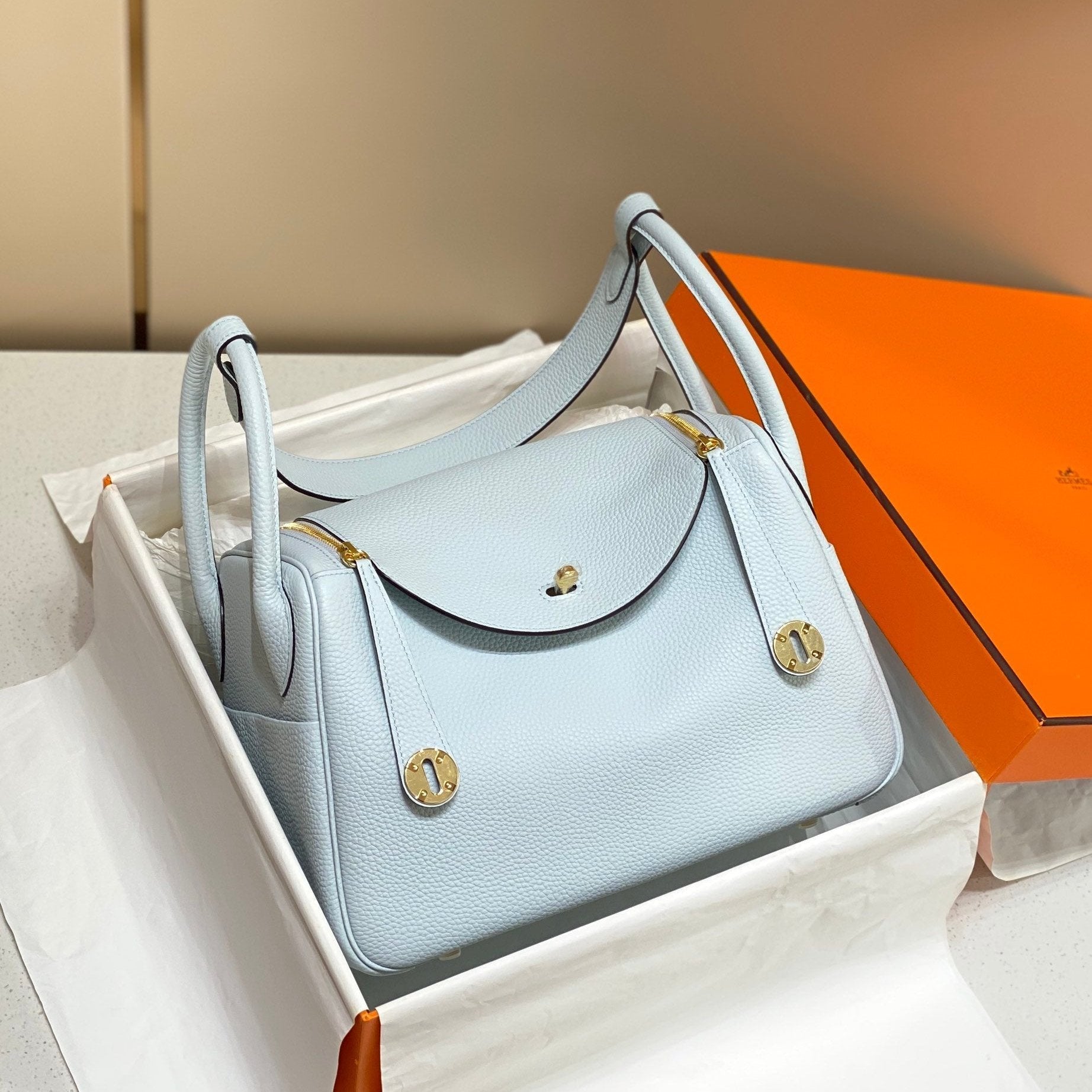 SAC HM LINDY 26 CUIR TAURILLON CLEMENCE BLEU PASTEL