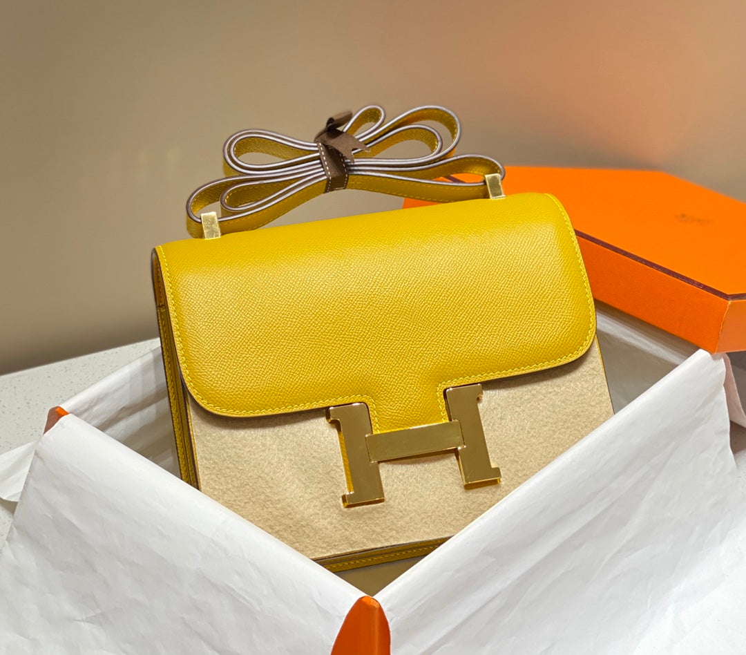 CONSTANCE 24 CUIR EPSOM JAUNE QUINCAILLERIE DORÉ
