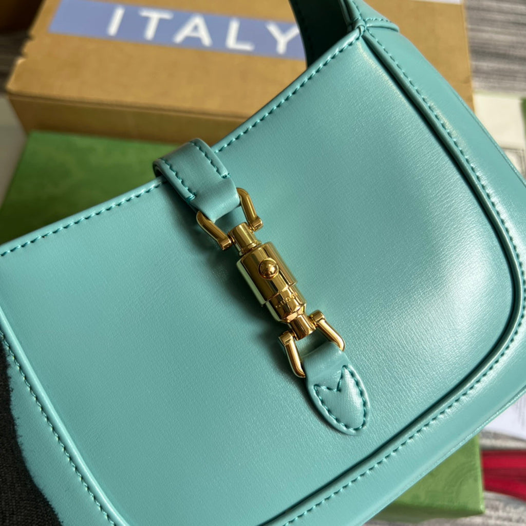 SAC À BANDOULIÈRE GG JACKIE MINI 19 EN CUIR DE VEAU BLEU PASTEL