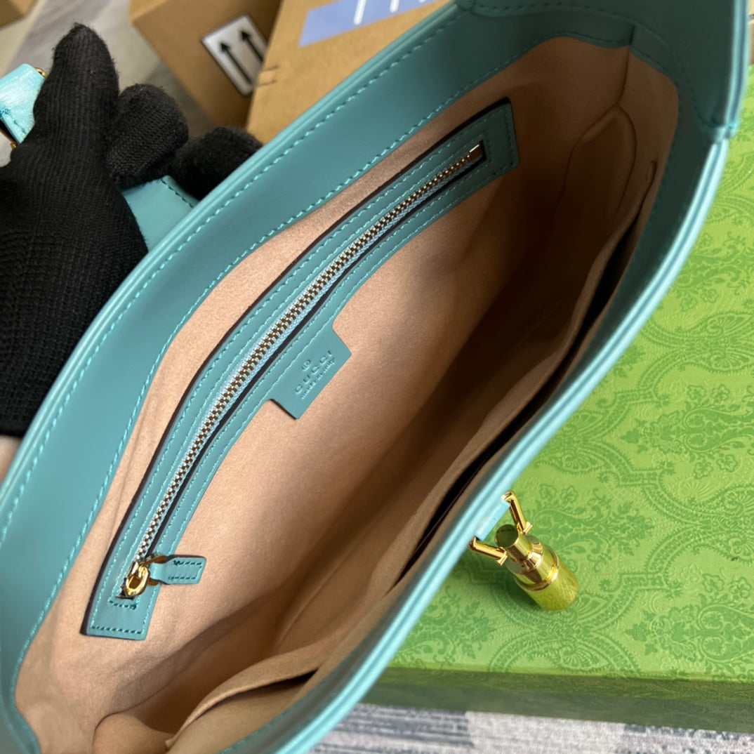 SAC À BANDOULIÈRE GG JACKIE SMALL 28 EN CUIR DE VEAU BLEU PASTEL