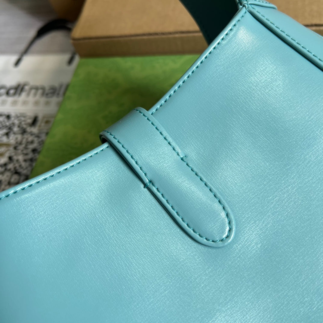 SAC À BANDOULIÈRE GG JACKIE SMALL 28 EN CUIR DE VEAU BLEU PASTEL