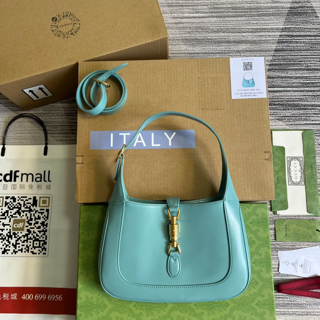 SAC À BANDOULIÈRE GG JACKIE SMALL 28 EN CUIR DE VEAU BLEU PASTEL
