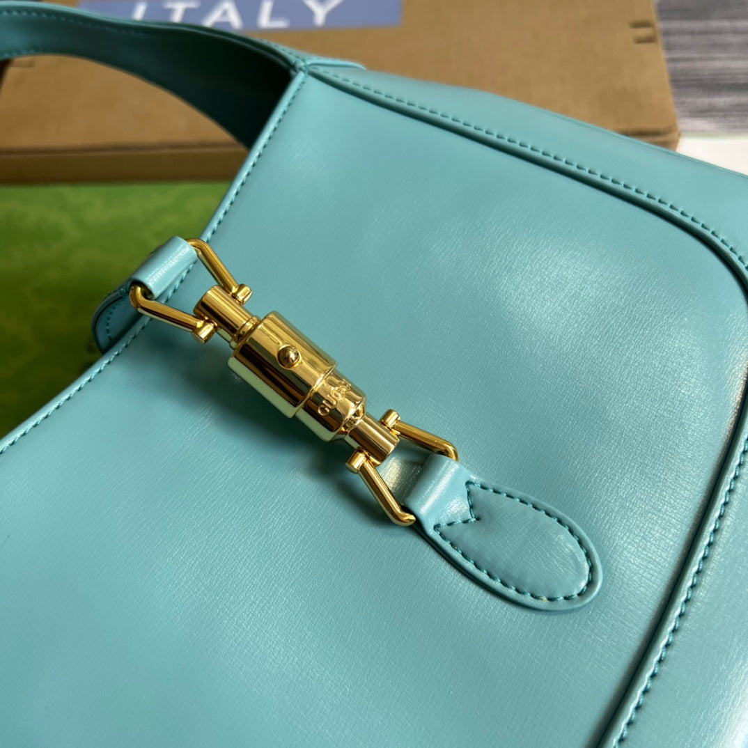 SAC À BANDOULIÈRE GG JACKIE SMALL 28 EN CUIR DE VEAU BLEU PASTEL