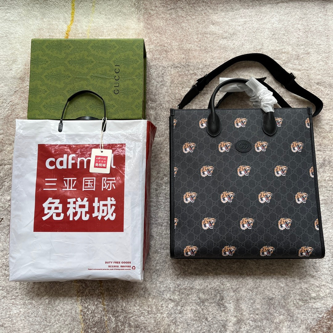 SAC CABAS MOYEN IMPRIMÉ TIGRE 38 EN TOILE NOIRE ET BORDURE EN CUIR
