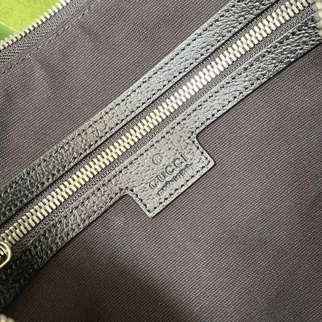 Pochette à imprimé tigre 30 en toile monogrammée noire