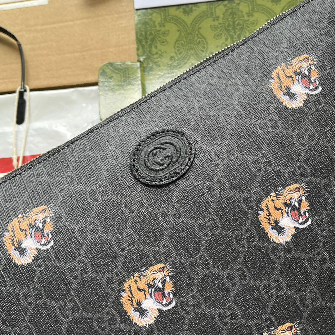 Pochette à imprimé tigre 30 en toile monogrammée noire
