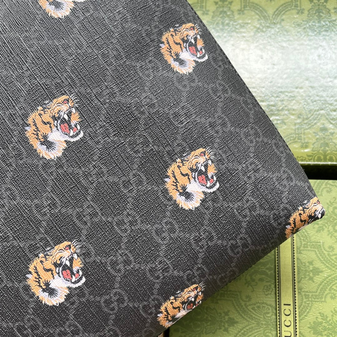 Pochette à imprimé tigre 30 en toile monogrammée noire